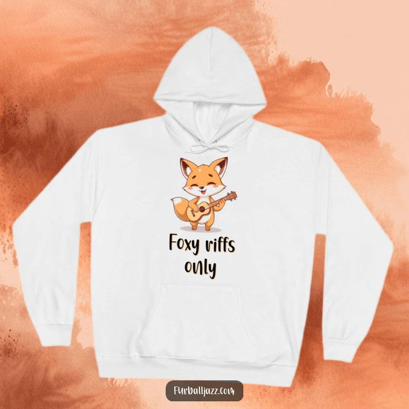 Funny fox character strumming a tiny, stylized guitar with glee, embodying musical energy on a warm, funny hoodie.