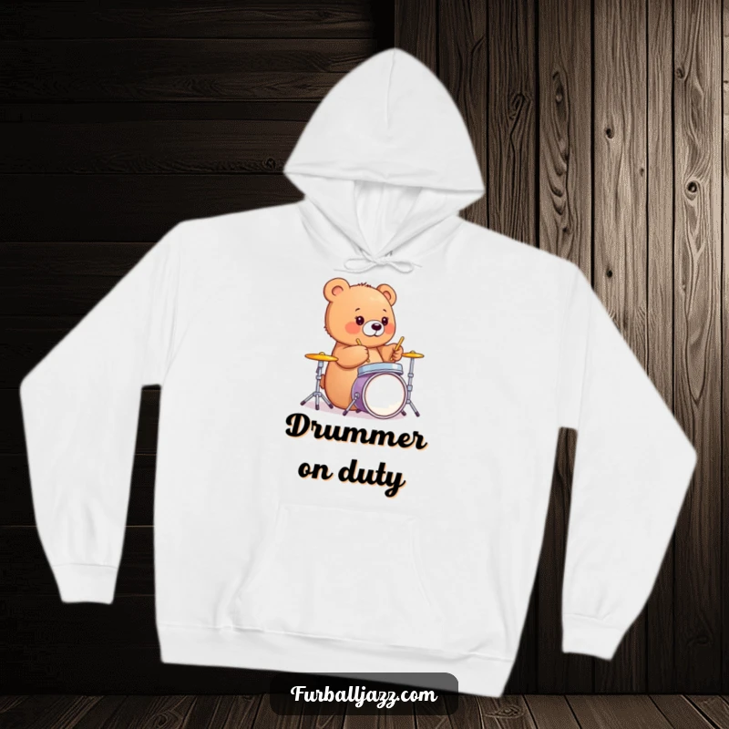 Funny bear cub joyfully drumming on a mini kit, a cozy and humorous hoodie for music fans.