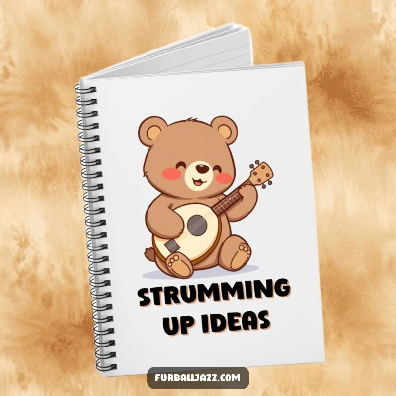 Funny bear strumming a tiny banjo with a happy expression on a notebook.