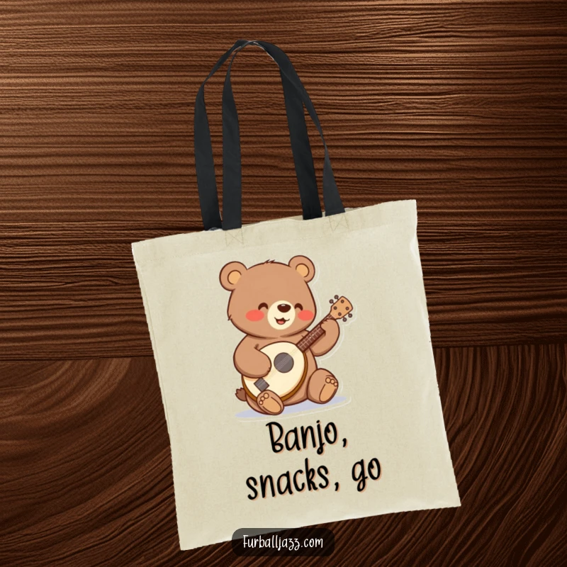 Funny bear strumming a tiny banjo with a happy expression on a tote bag.