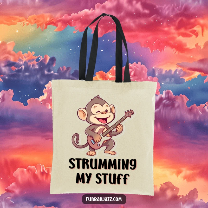 Funny mischievous monkey playing an energetic guitar solo, a humorous tote bag for music enthusiasts.